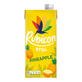 A 1L yellow carton of Rubicon Still Pineapple Juice Drink, decorated with a vibrant hummingbird and pineapple images, offers nutritional info at the bottom—ideal for enjoying tropical sweetness and hydration.